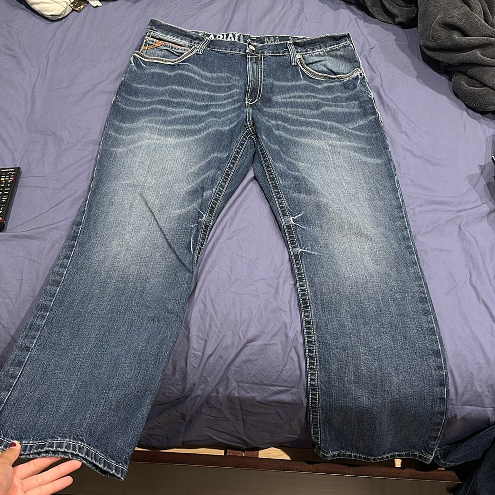 Brand: Ariat, Size: 42x32, Color: Dark/distressed denim jeans
